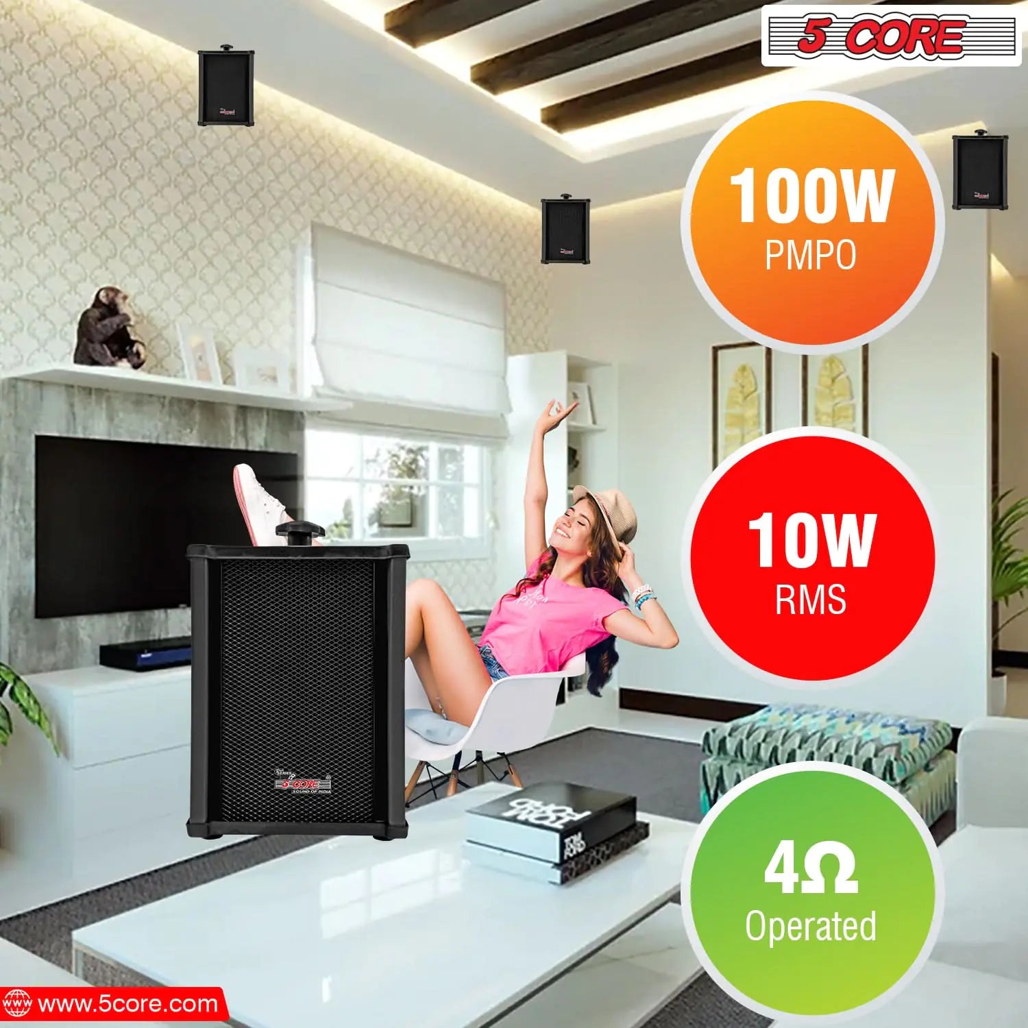 Craques black outdoor stereo wall speakers mounted in a modern living room with power specs highlighted