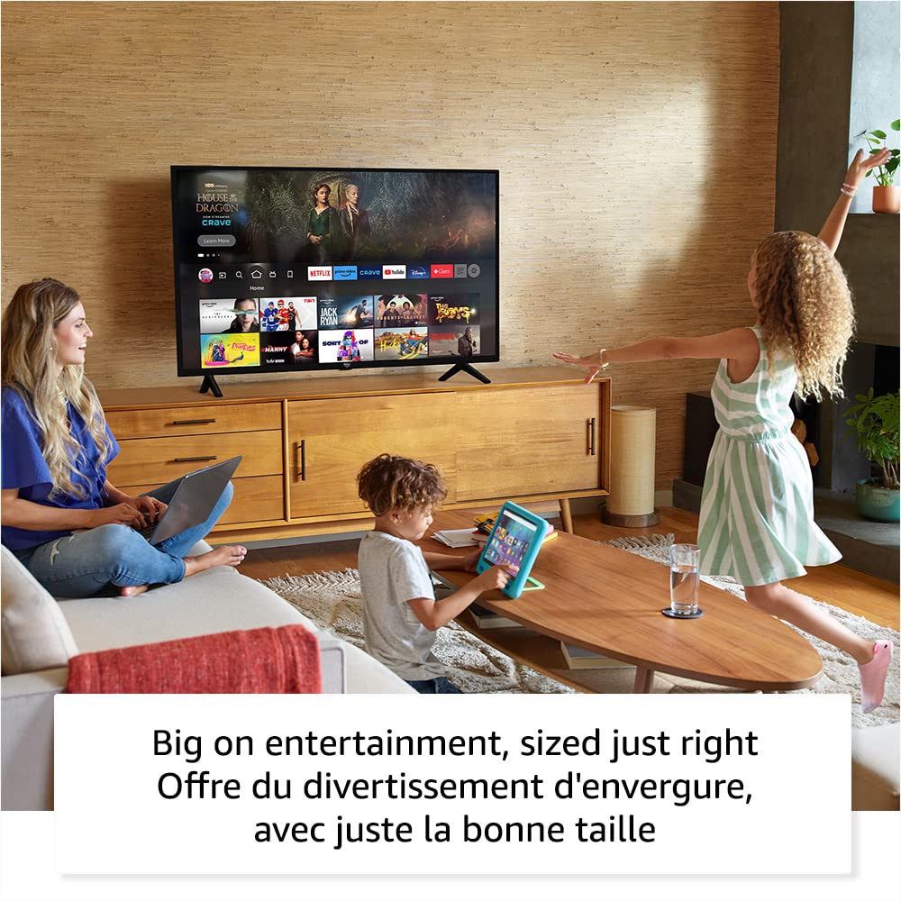 Amazon Fire TV 40 inch smart TV on wooden stand with family enjoying entertainment in living room