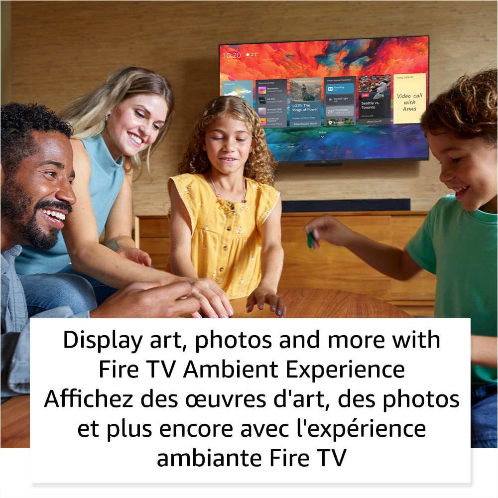 Amazon Fire TV 50 inch QLED displaying colorful ambient screen with family enjoying in living room