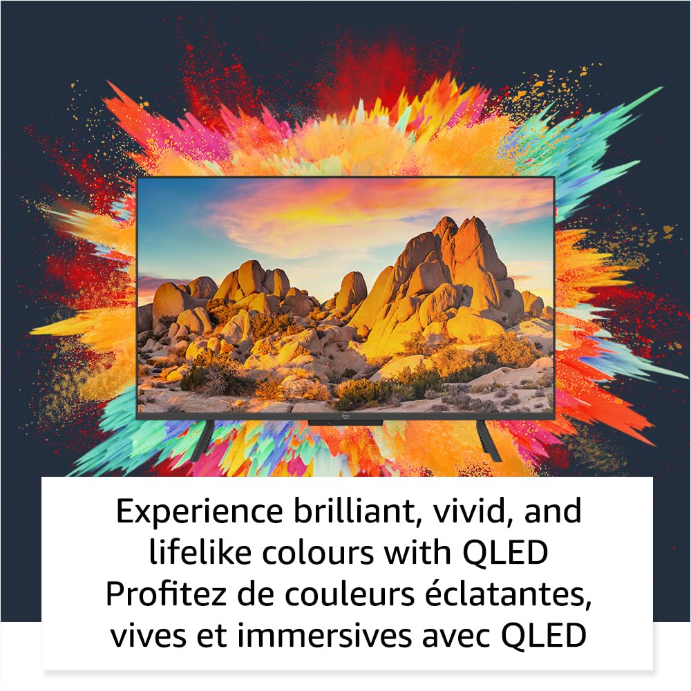 Amazon Fire TV 50 inch QLED showing vivid desert landscape with colorful background splash