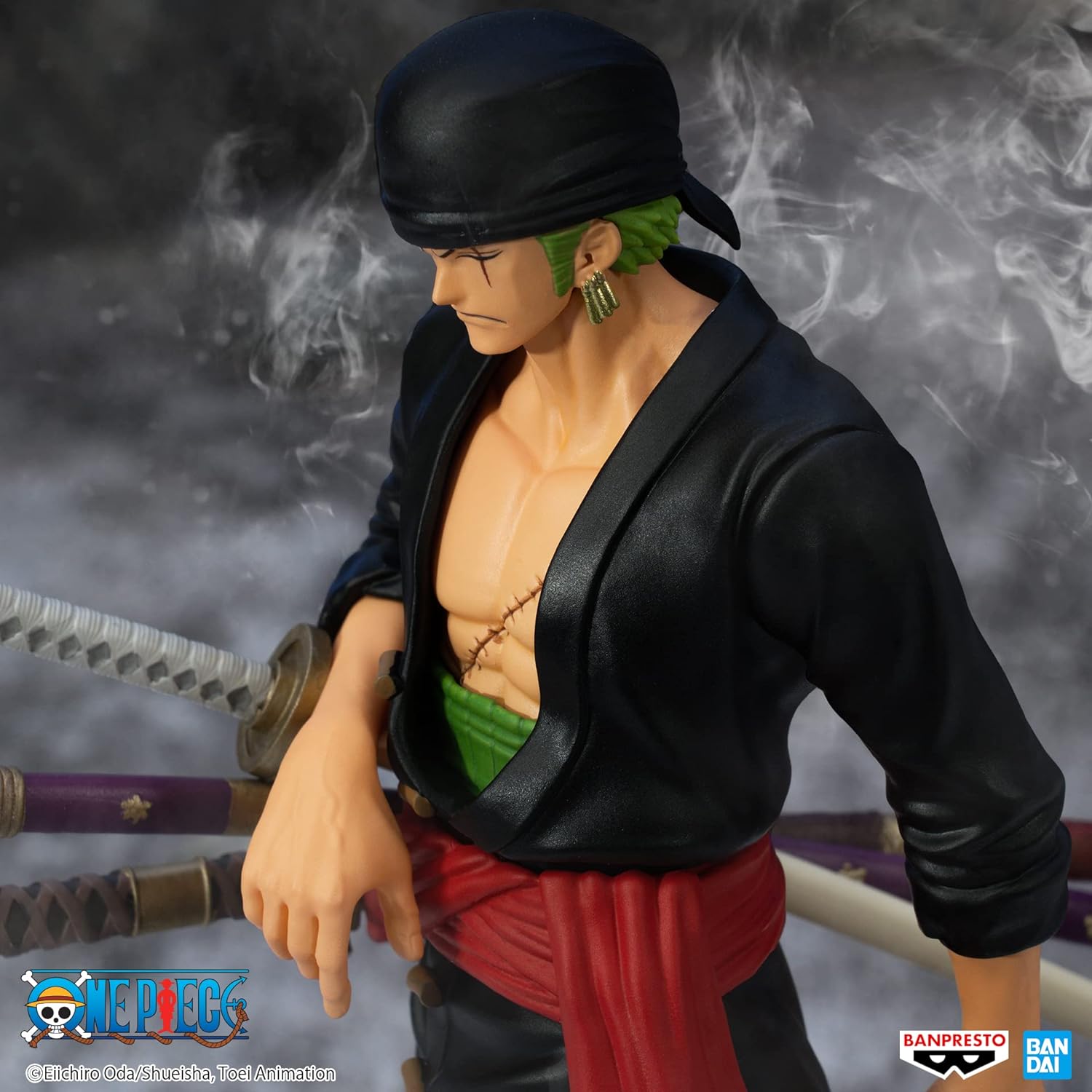 Banpresto One Piece Zoro figure wearing black outfit with three swords and scar on chest