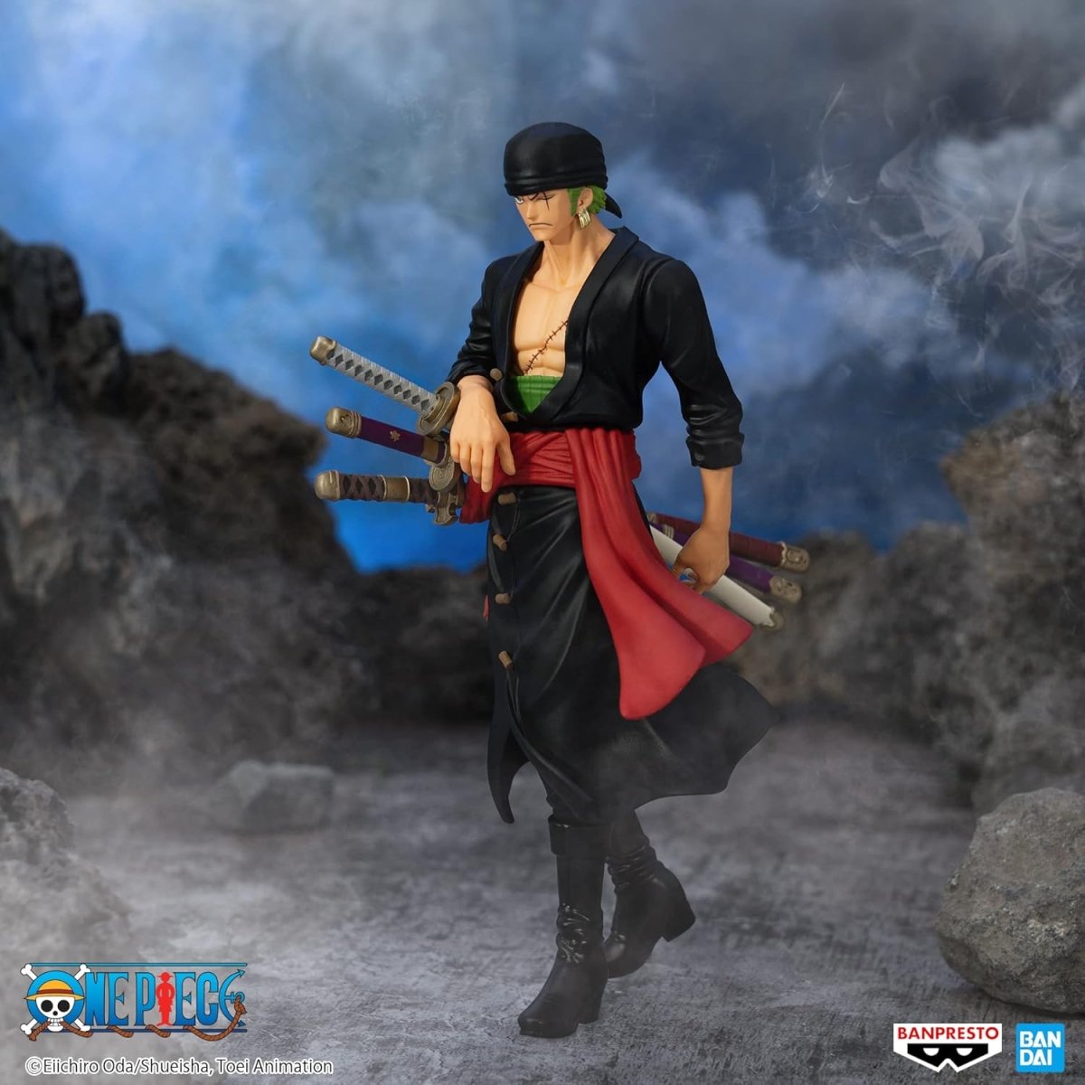 Banpresto One Piece Zoro figure in black outfit with swords standing on rocky terrain with smoky background