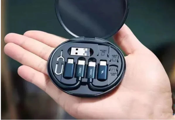 Craques multi-port charging organizer compact case with USB adapters and connectors held in hand