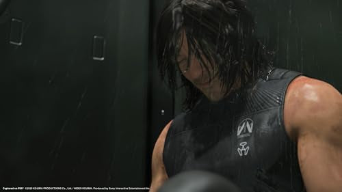 Close-up of a character from Death Stranding 2 Collector's Edition PS5 wearing black armor in rain