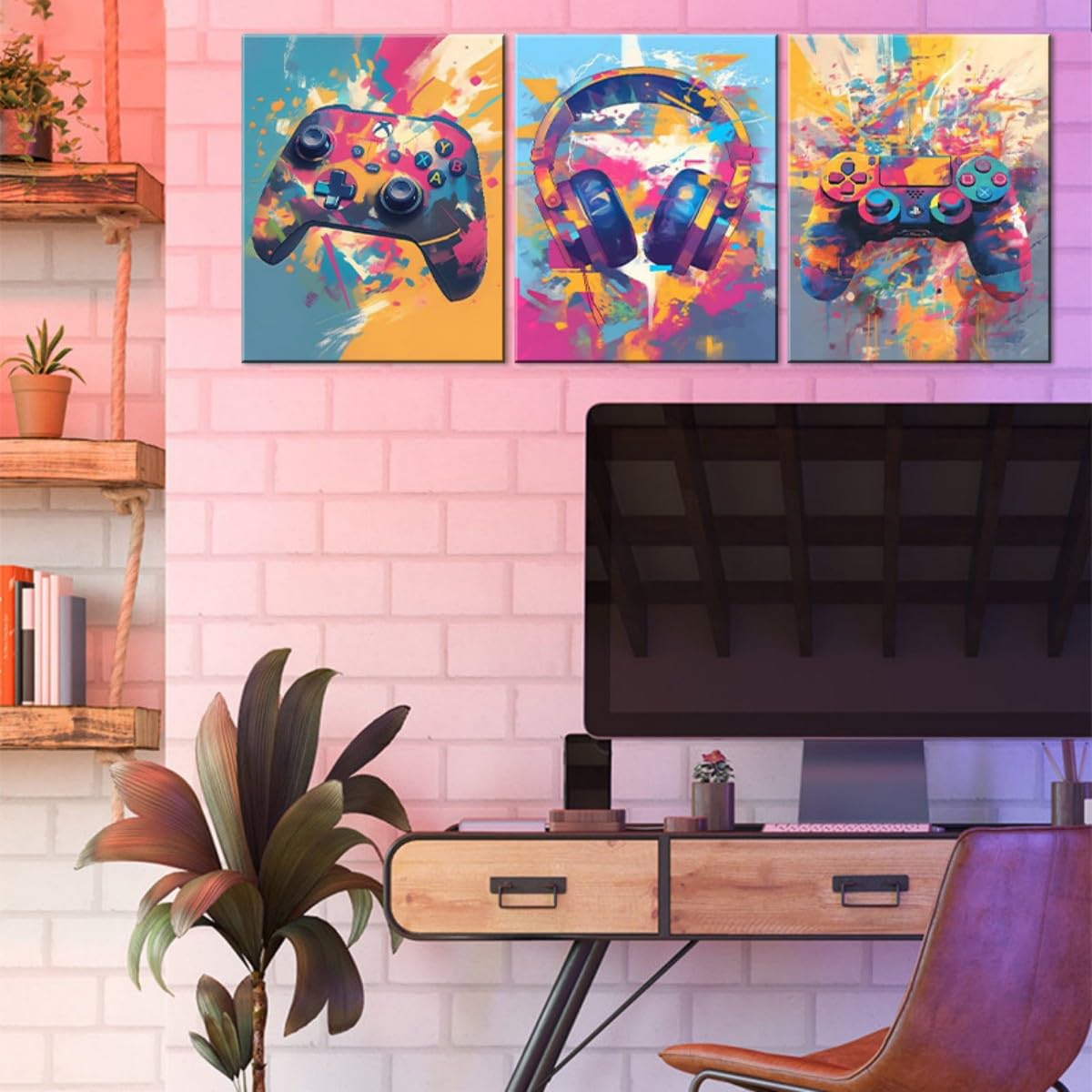 Colorful gaming wall art framed featuring a controller and headphones above a computer desk setup