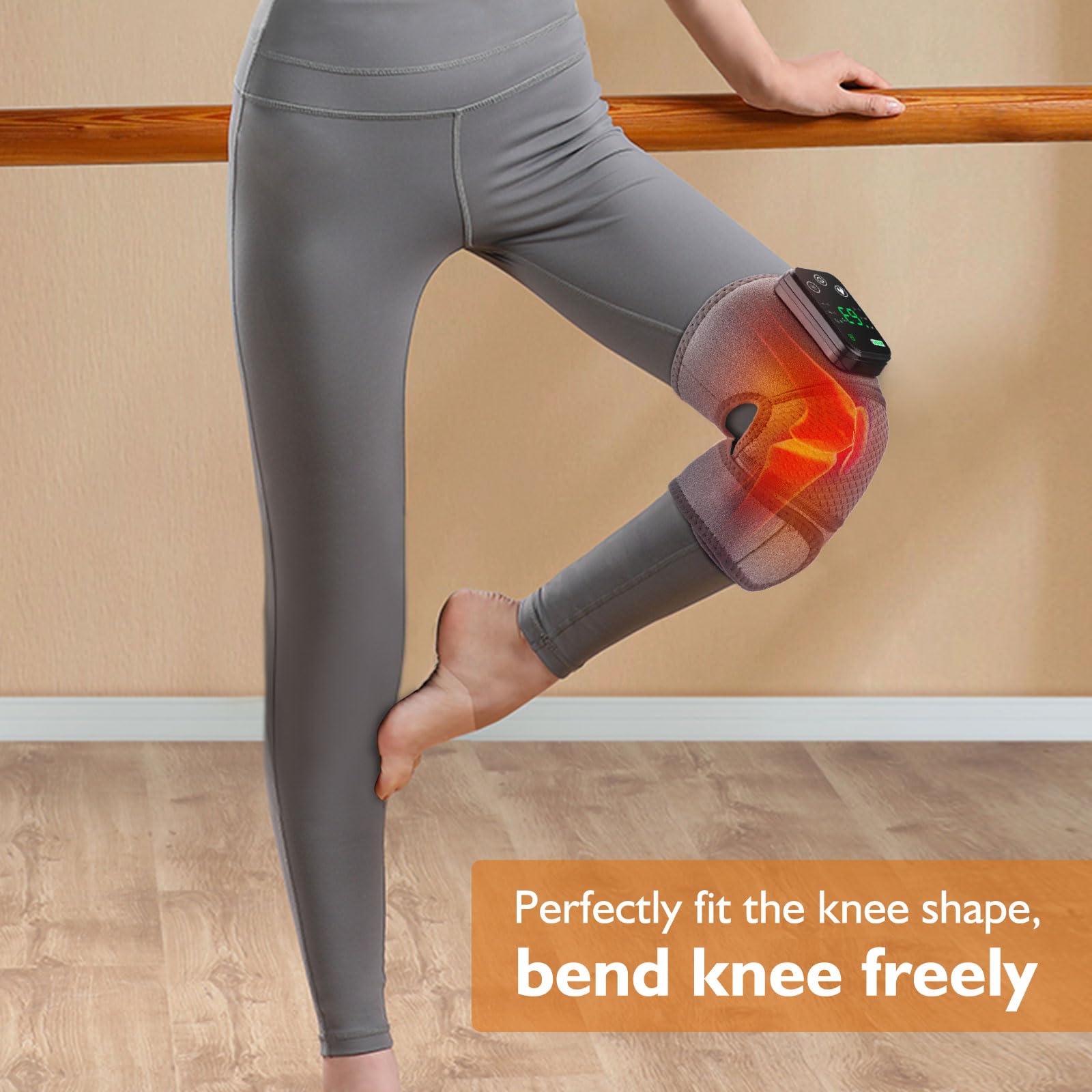 Craques heated knee brace for pain relief worn on a bent knee with adjustable control unit