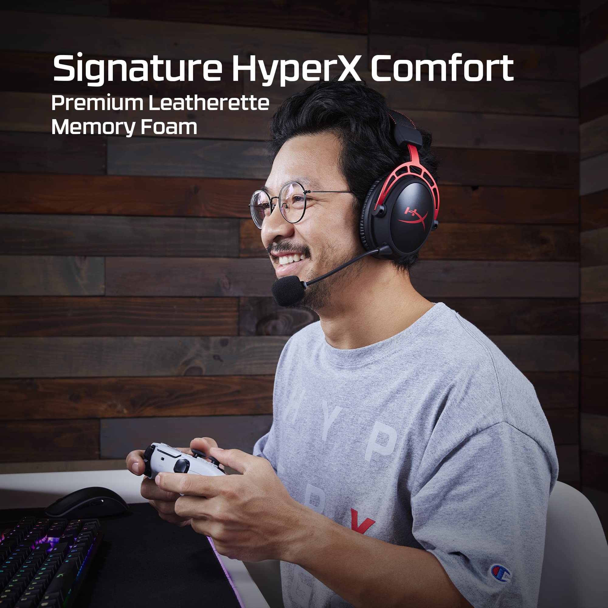 Man wearing HyperX Cloud Alpha gaming headset with premium leatherette and memory foam while playing video games