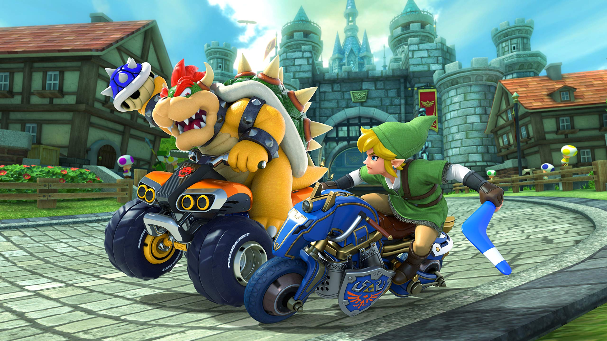 Mario Kart 8 Deluxe Nintendo Switch gameplay featuring Bowser and Link racing on bikes in a castle town