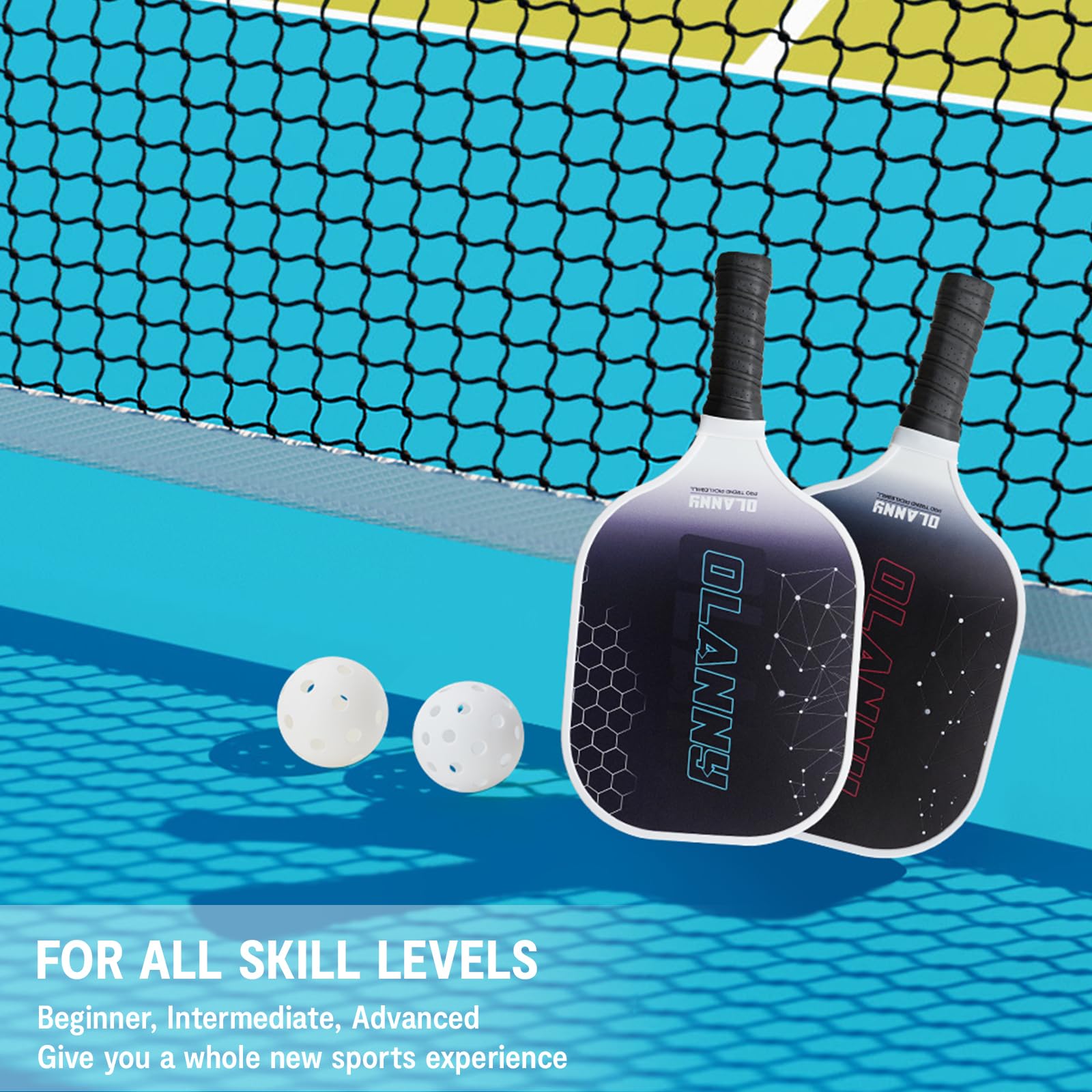 Craques graphite pickleball paddle set with two paddles and two balls on a blue court by the net