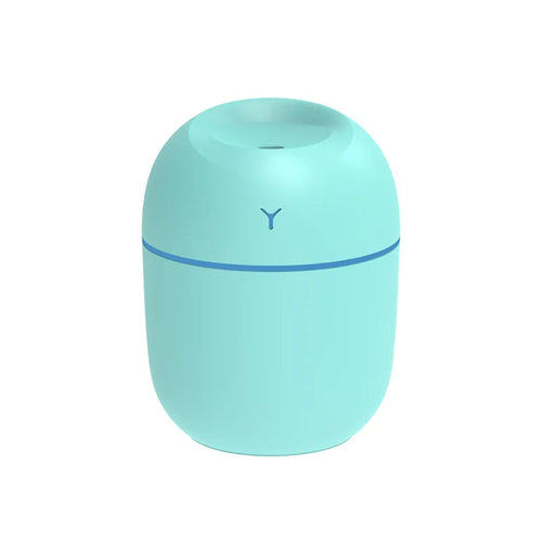 Portable ultrasonic humidifier in teal color for enhanced air moisture and comfort