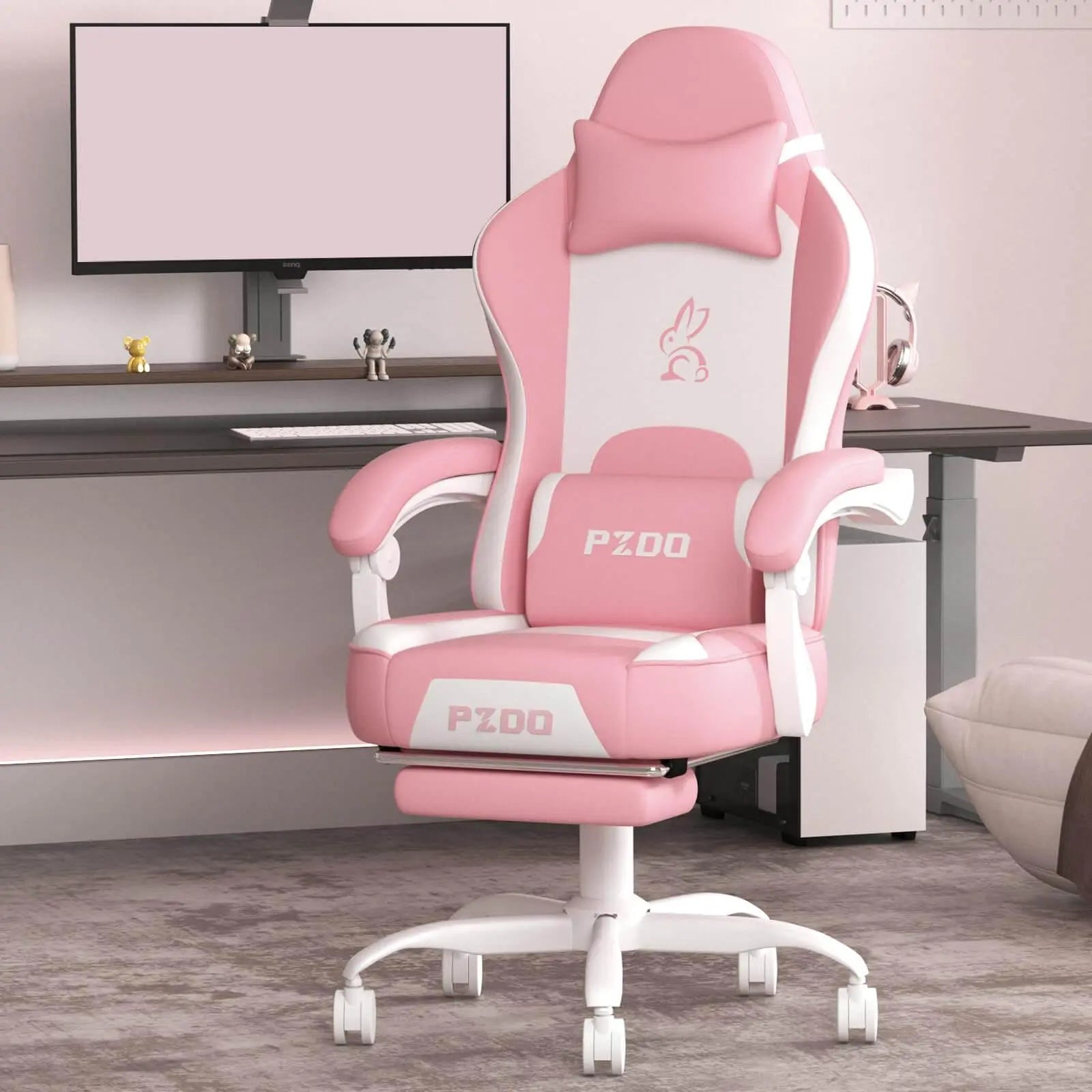 Ergonomic gaming chair for adults in pink and white with padded armrests and lumbar support