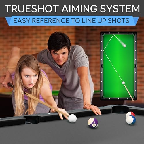 Couple playing on a foldable pool table for home featuring Trueshot aiming system for easy shot lining