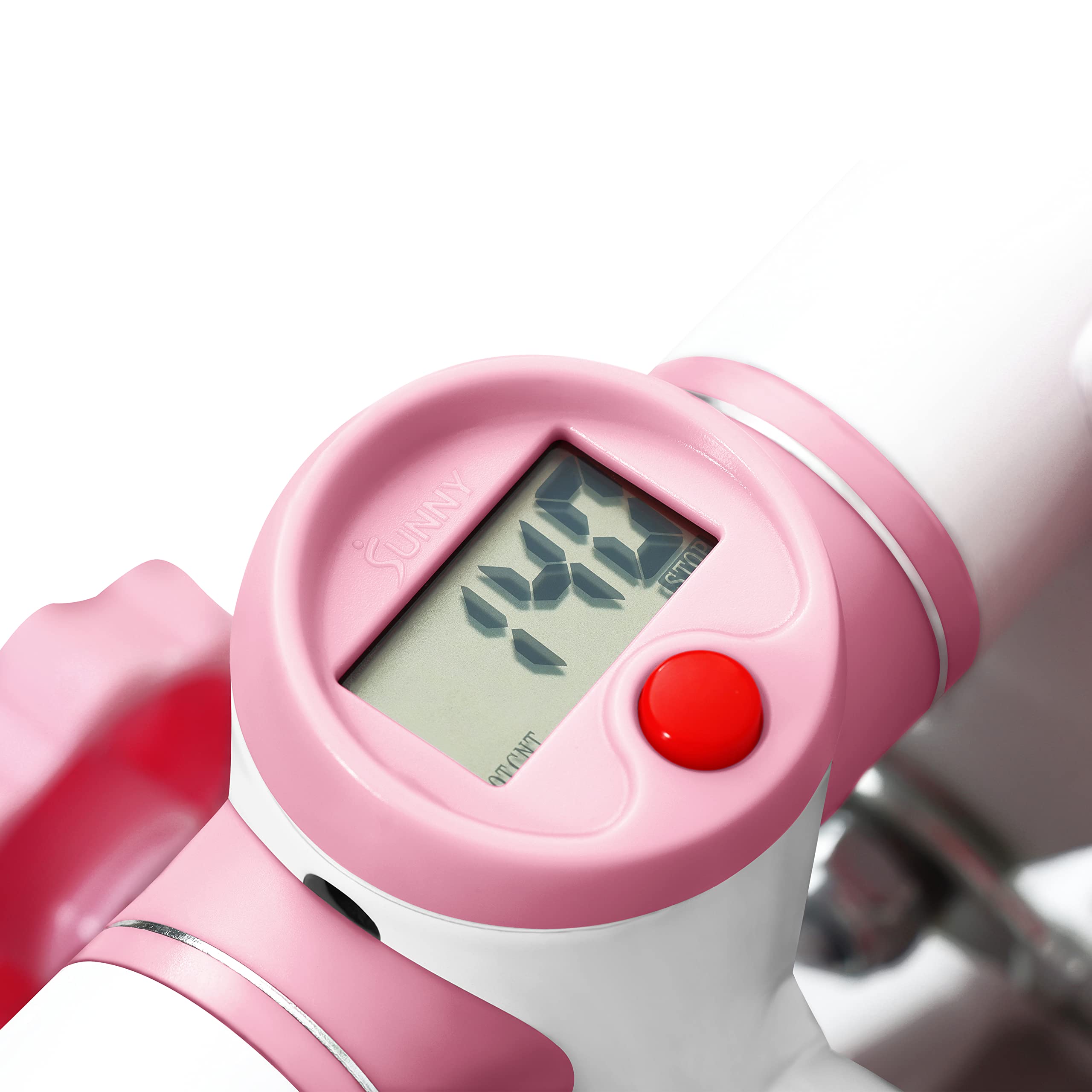 Close-up of digital display on pink and white mini stepper for home use showing workout stats