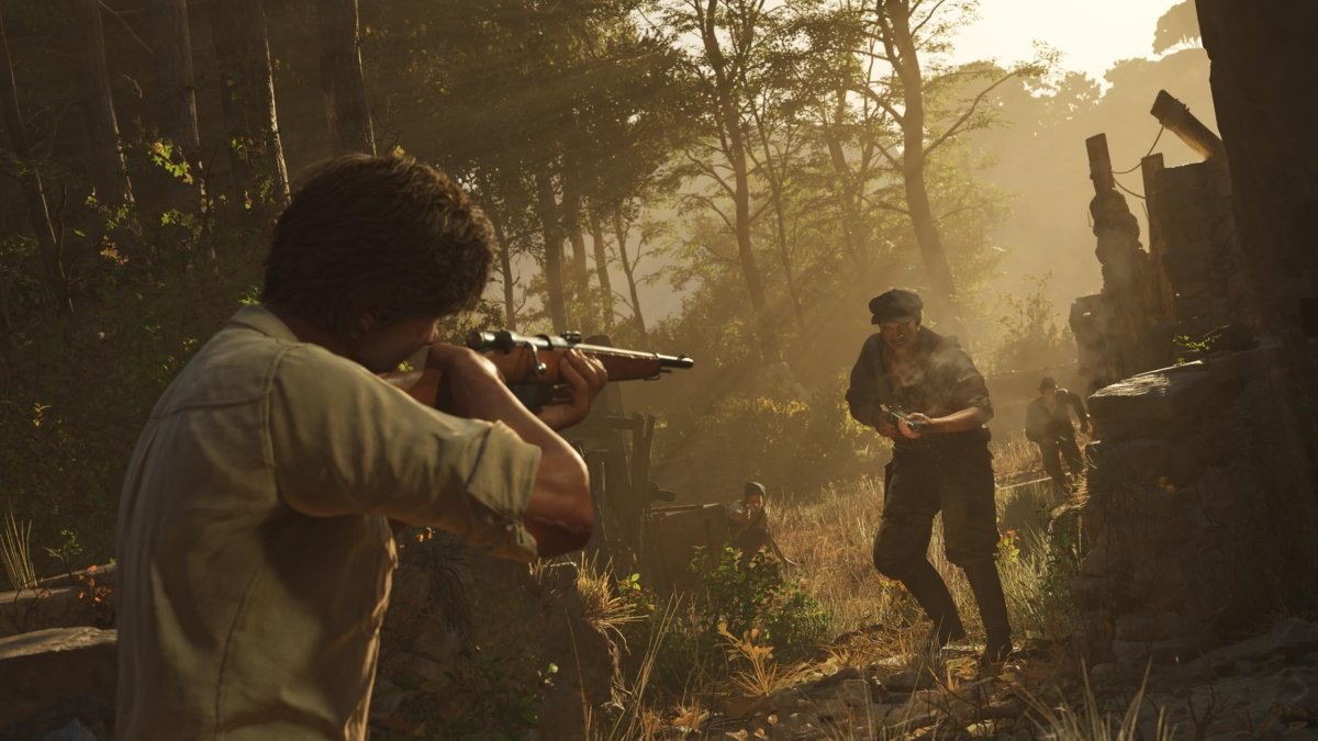 Action scene from Mafia The Old Country PS5 showing a character aiming a rifle at enemies in a dense forest