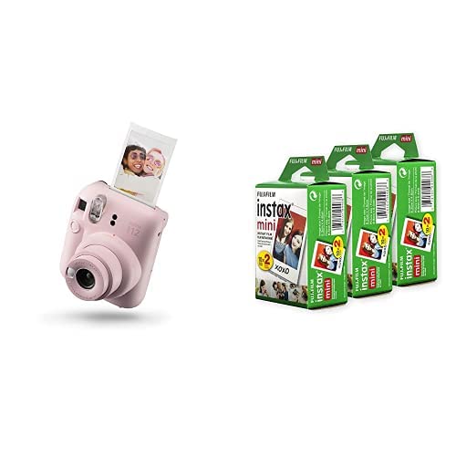 Pink Fujifilm Instax Mini 12 instant camera with instant photo and three packs of Fujifilm Instax Mini film