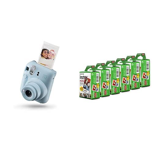 Fujifilm Instax Mini 12 instant camera in blue with printed photo and pack of instant film cartridges