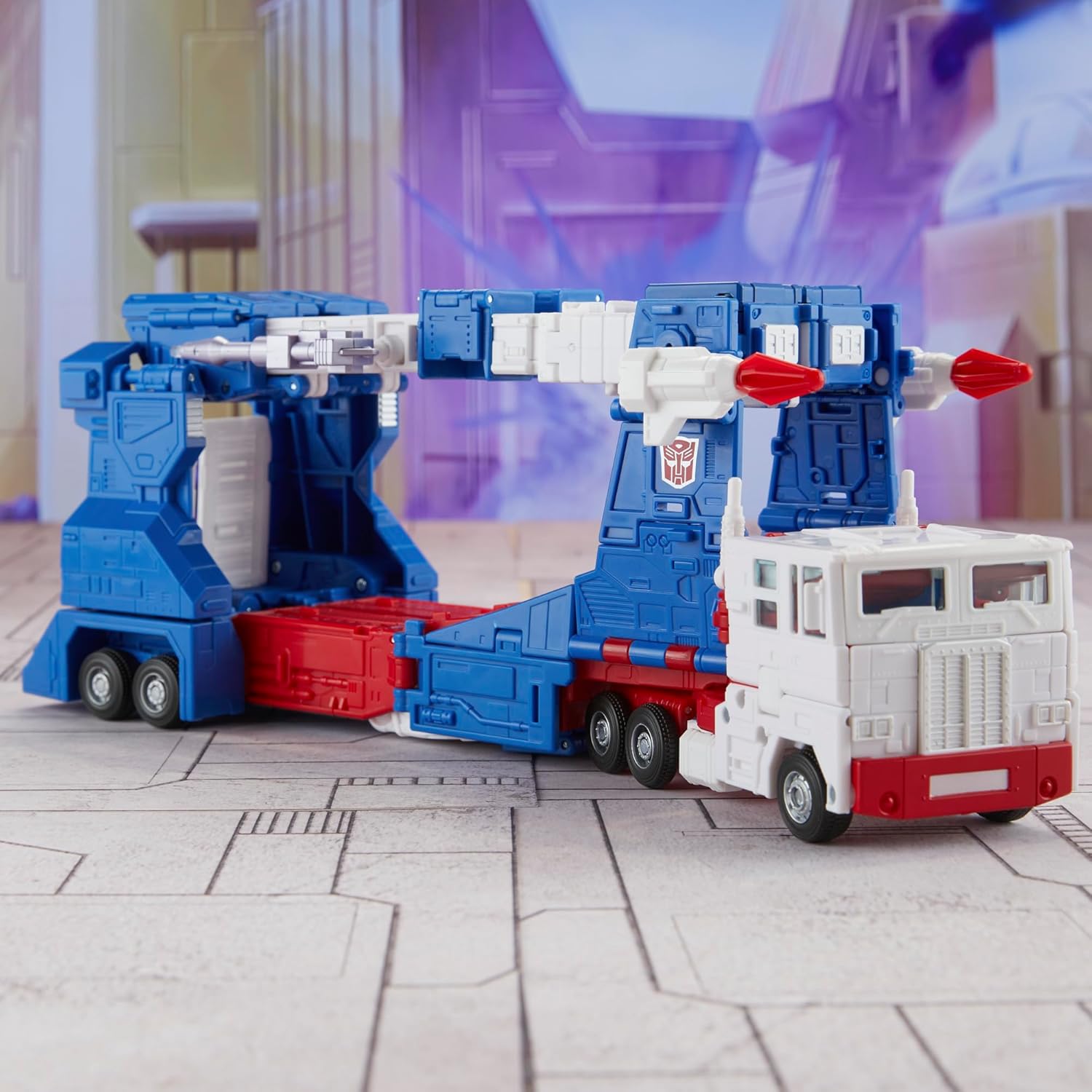 Transformers Ultra Magnus action figure in truck mode with blue, white, and red detailing and missile launchers
