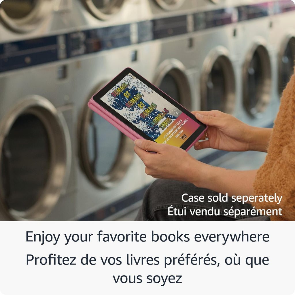Person holding Amazon Fire HD 8 tablet with pink case at laundromat reading an eBook