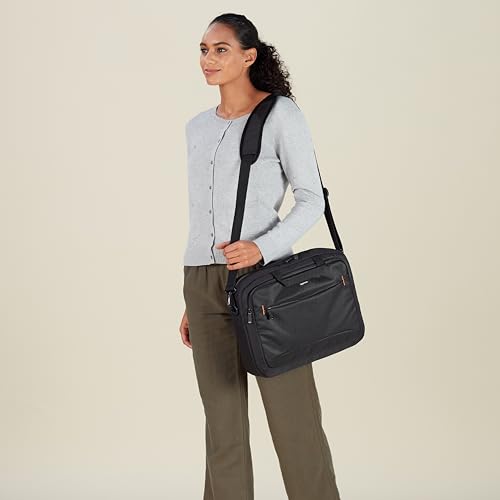 Craques black laptop carrying case 15.6 inch worn by woman with adjustable shoulder strap