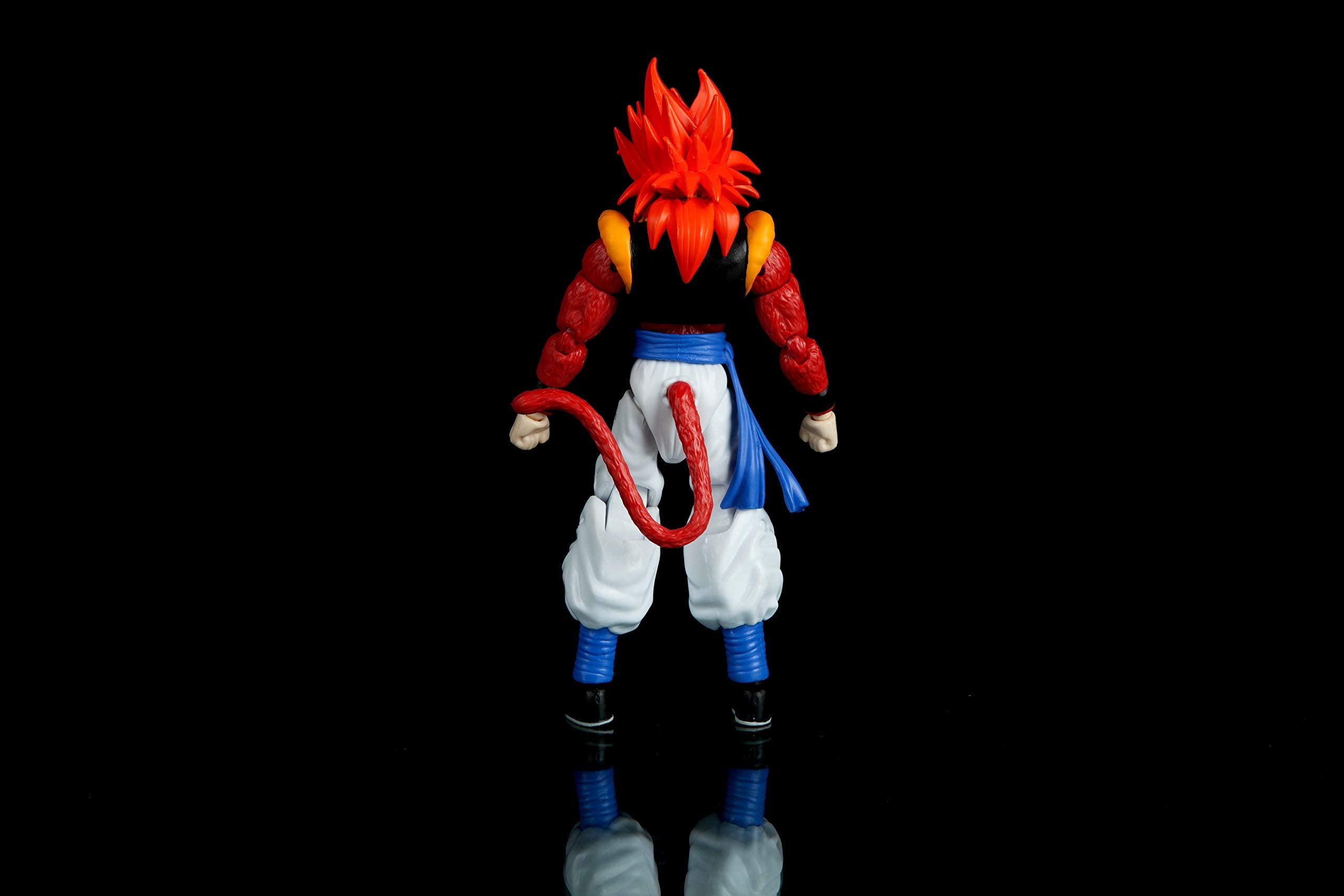 Super Saiyan 4 Gogeta action figure by craques shown from the back with vibrant red hair and tail