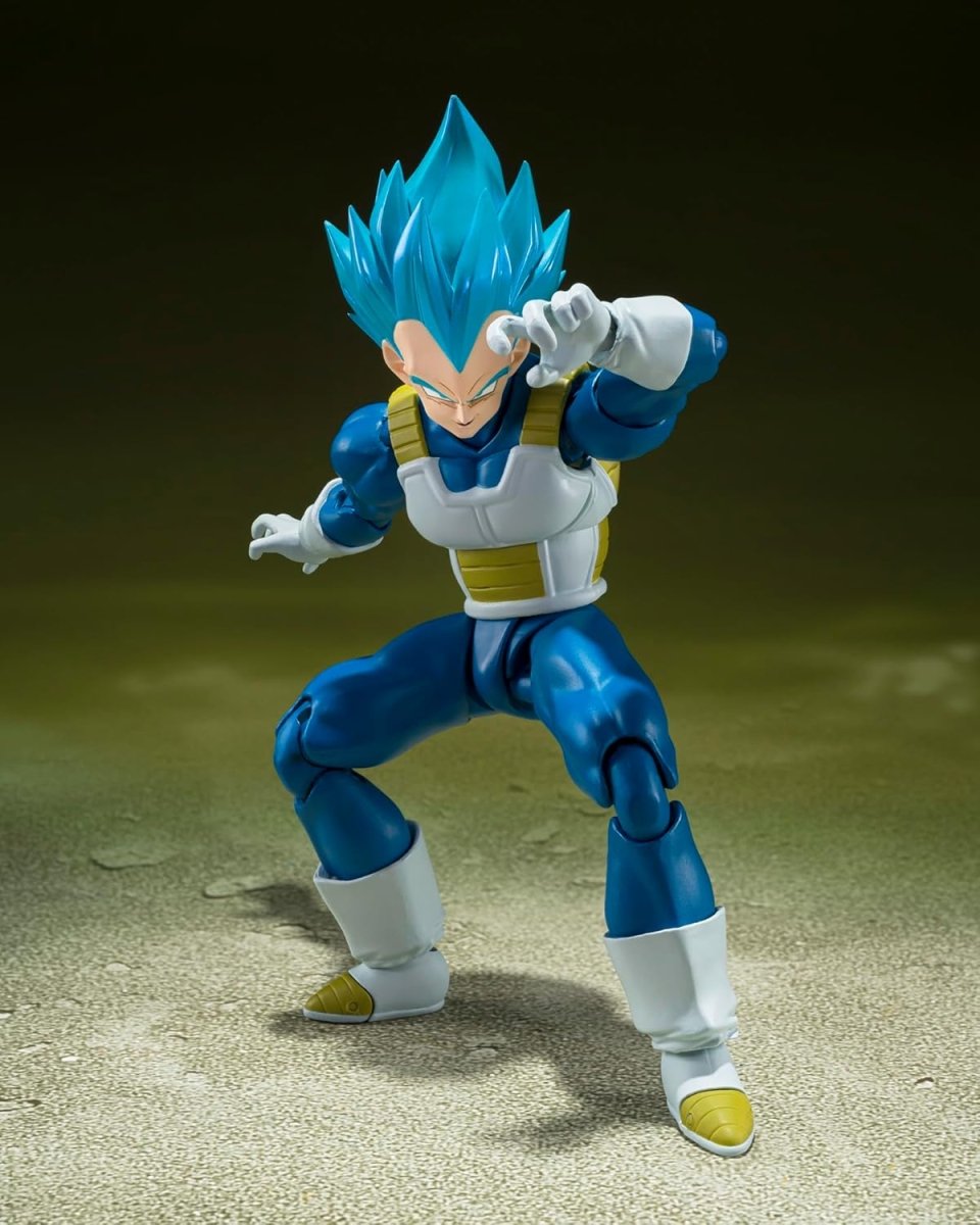 Craques Super Saiyan God Vegeta action figure in dynamic battle pose with blue hair and armor