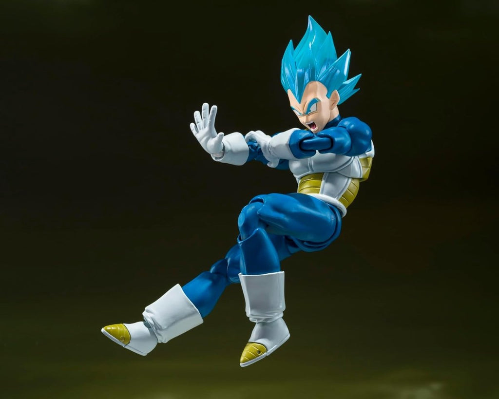 Craques Super Saiyan God Vegeta action figure with blue hair and white combat armor in dynamic pose