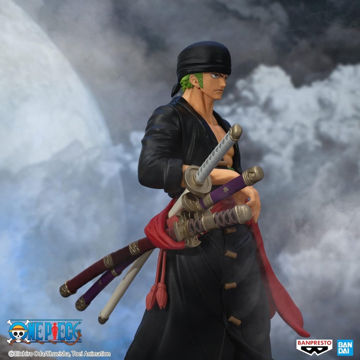 Banpresto One Piece Zoro figure in black outfit holding three swords with red sash detailed craftsmanship