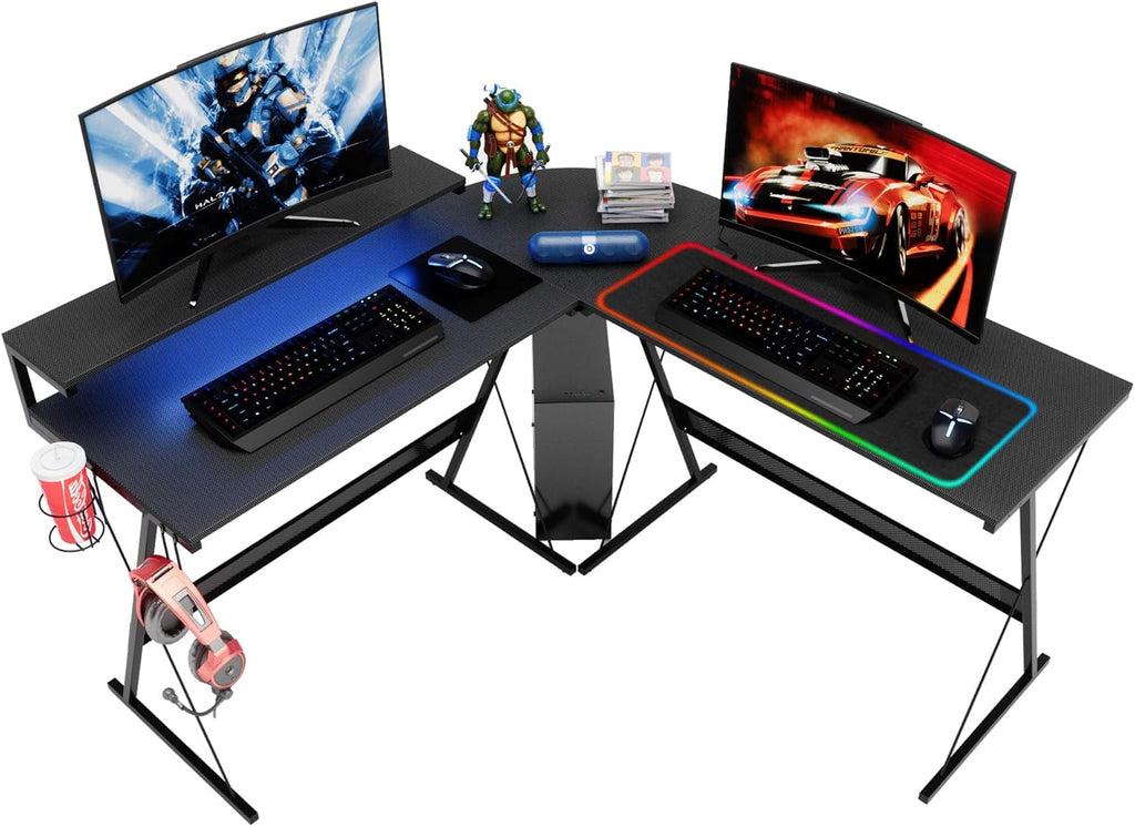 Craques L shaped gaming desk with LED featuring dual monitors, RGB keyboard, mousepad, and headset holder