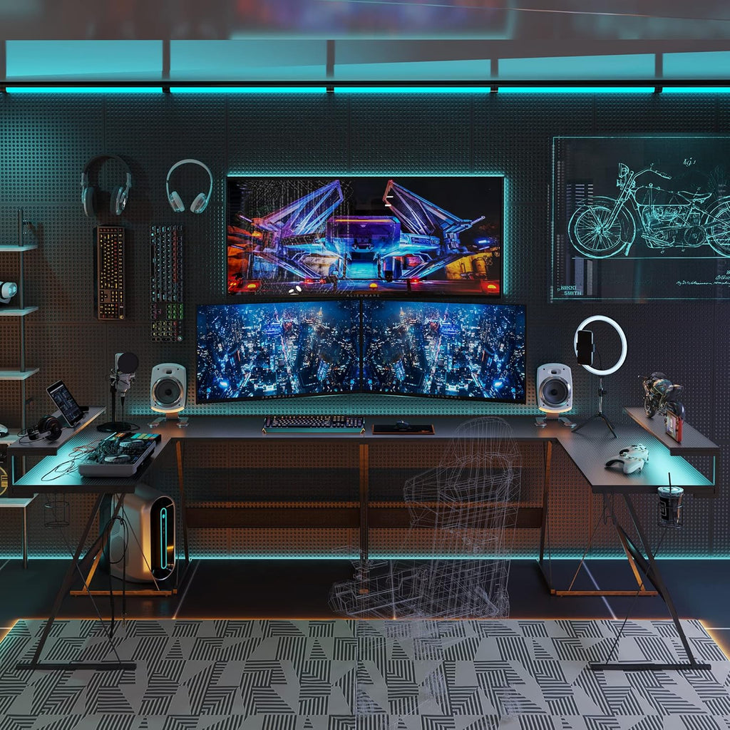 Craques L shaped gaming desk with LED lights featuring dual monitors and gaming accessories setup