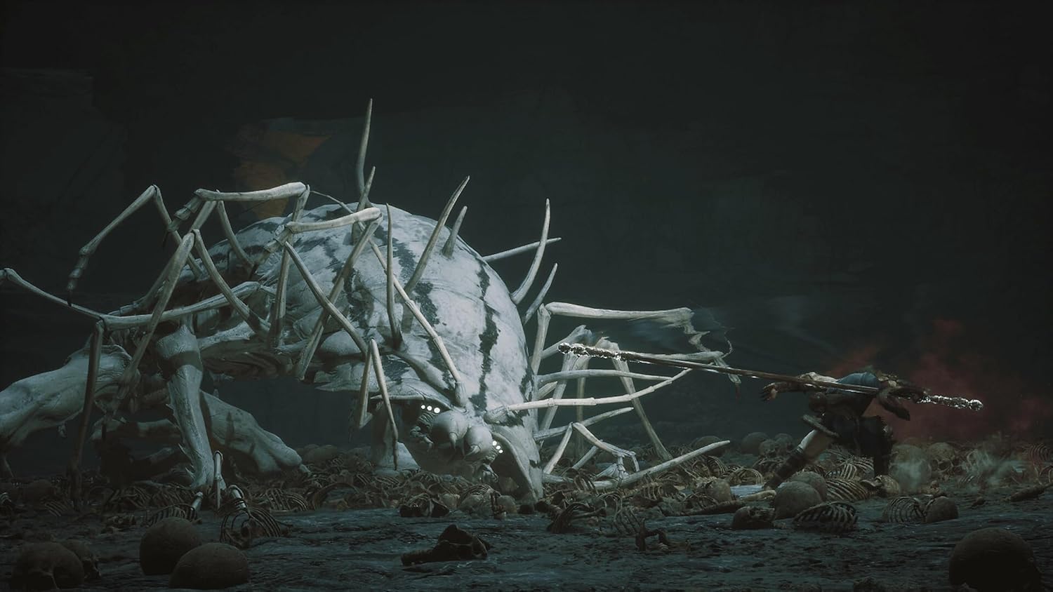 Black Myth Wukong PS5 game scene showing a character battling a giant spider monster in a dark environment