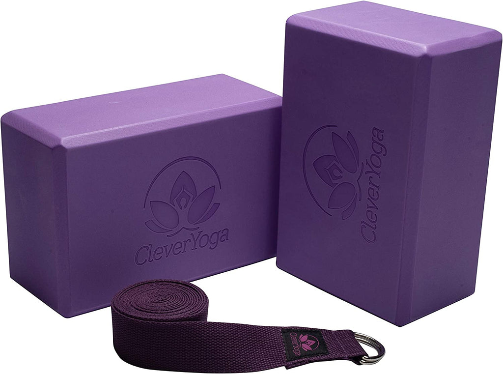 Purple lightweight foam yoga blocks with CleverYoga logo and a matching yoga strap for support