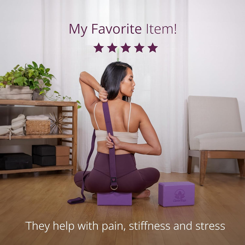 Woman using lightweight foam yoga blocks and strap for back stretch and pain relief at home