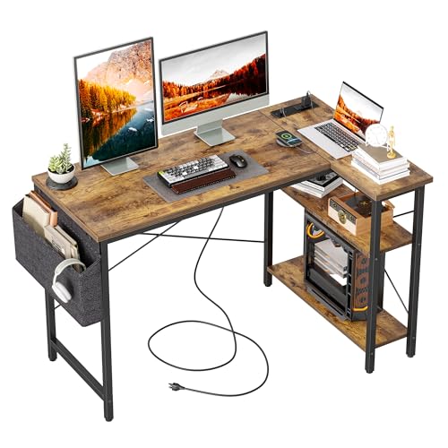 Craques computer desk with power outlets featuring a rustic wood surface and metal frame with storage shelves