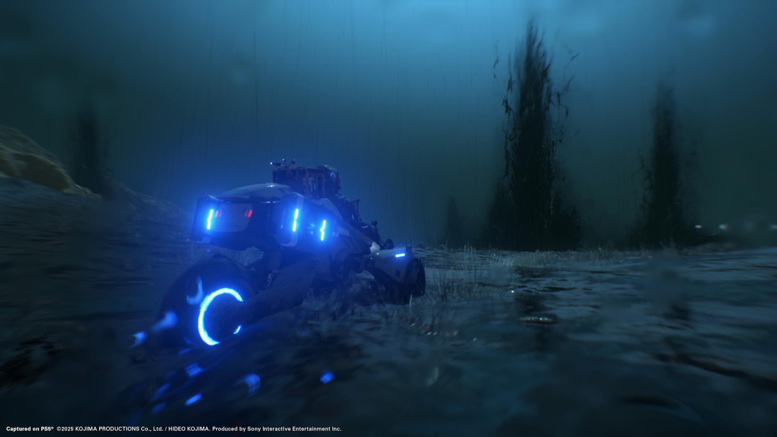 Death Stranding 2 Collector's Edition PS5 game screenshot showing futuristic vehicle with blue lights in dark environment
