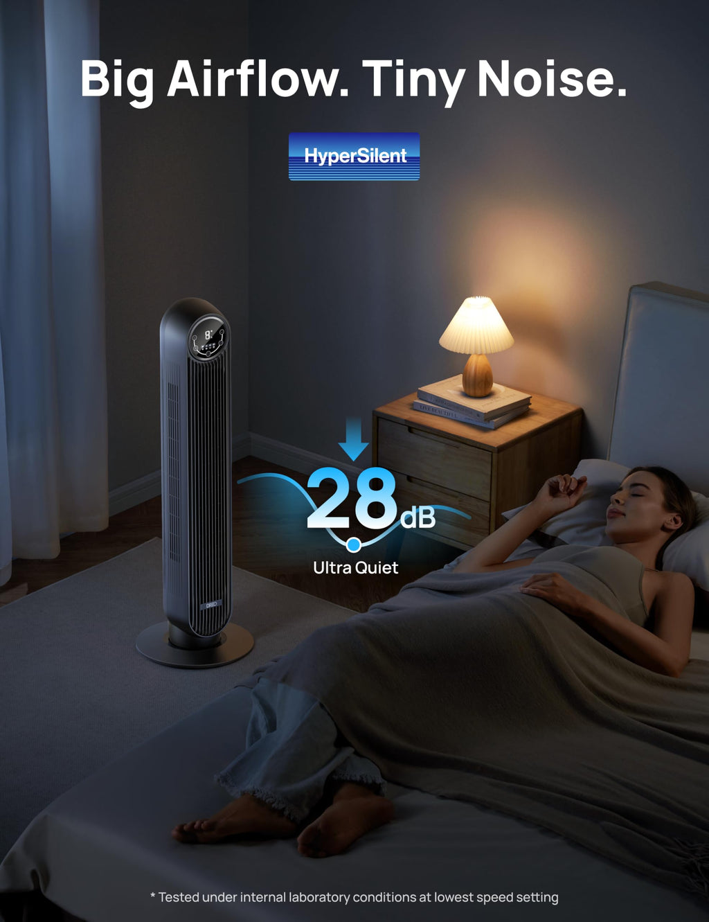craques quiet tower fan for bedroom beside bed with a person sleeping and ultra quiet 28 dB noise