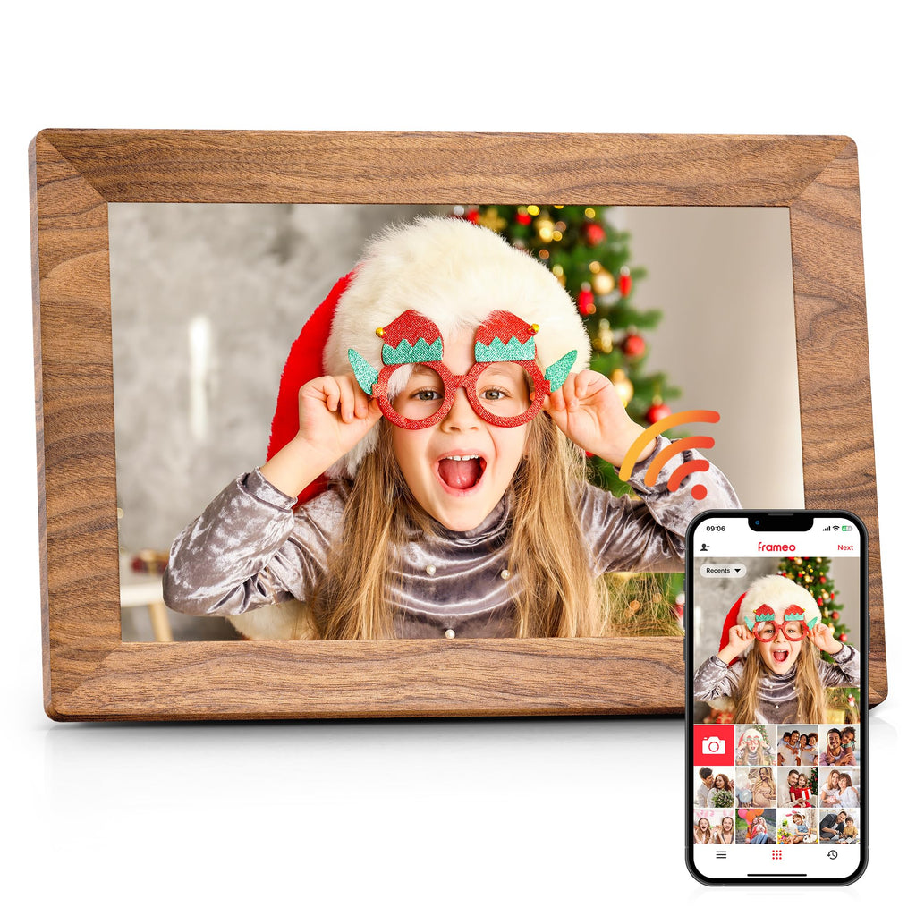 Frameo WiFi digital picture frame by craques showing holiday photo with smartphone app syncing images