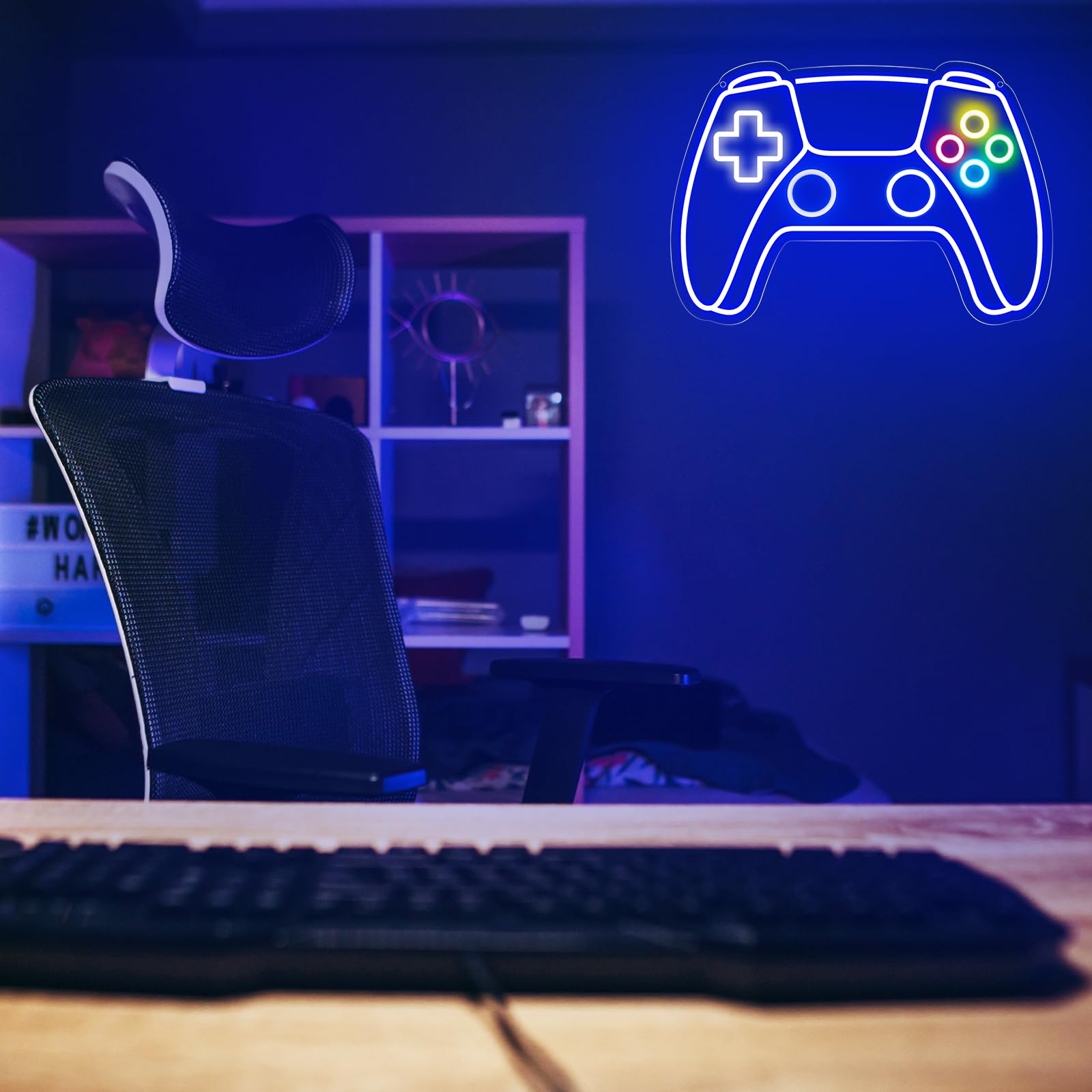 Craques gamer neon sign shaped like a colorful video game controller glowing on a dark wall