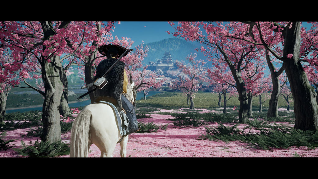 Scene from Ghost of Yōtei PS5 game showing character on horseback in pink cherry blossom forest