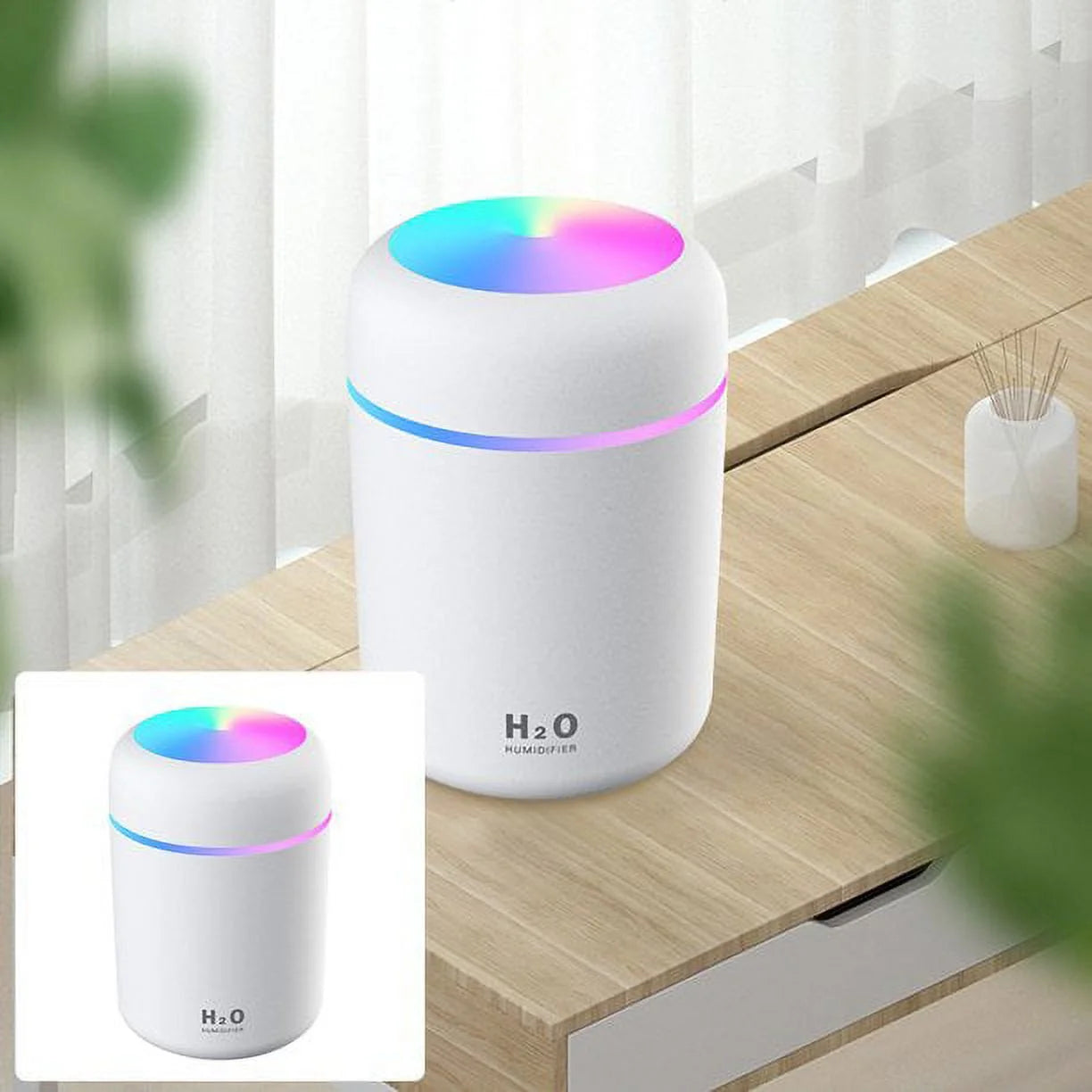 Craques portable mini humidifier with colorful LED light on wooden table near window