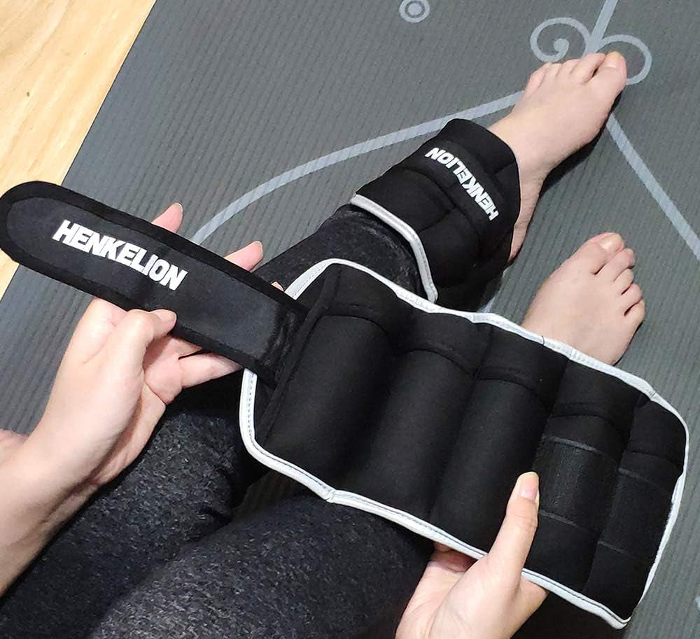 Adjustable ankle weights for workout in black with sturdy straps worn on legs during exercise
