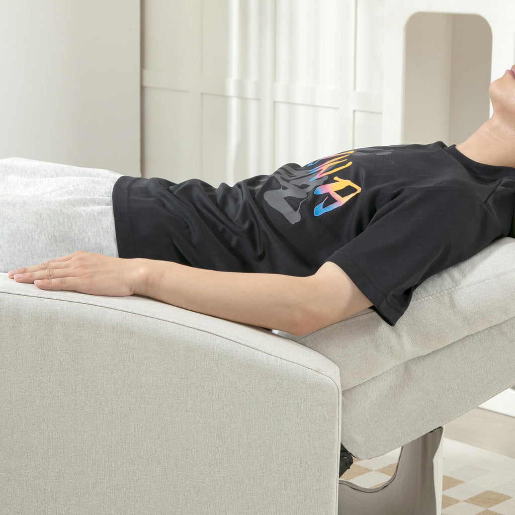 HOMCOM push back recliner chair in light gray fabric with person reclining comfortably in living room