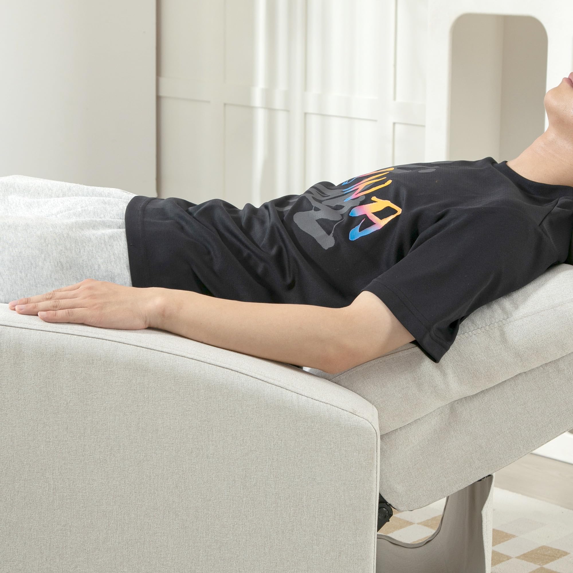 HOMCOM push back recliner chair in light gray fabric with person reclining comfortably in living room