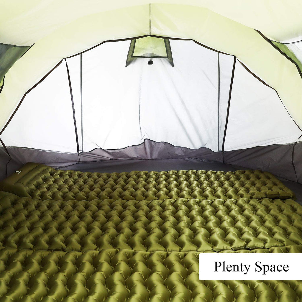 Interior view of craques 6 person pop up camping tent with green inflatable sleeping mats and plenty of space
