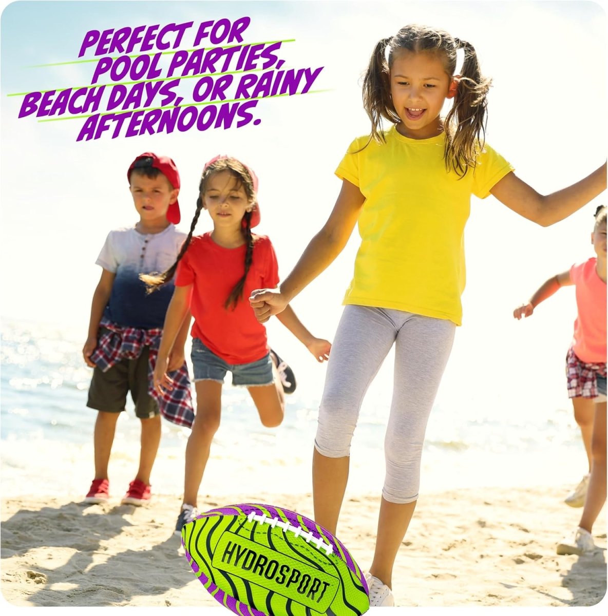 Kids playing with a bright green and purple water football ball on a sunny beach