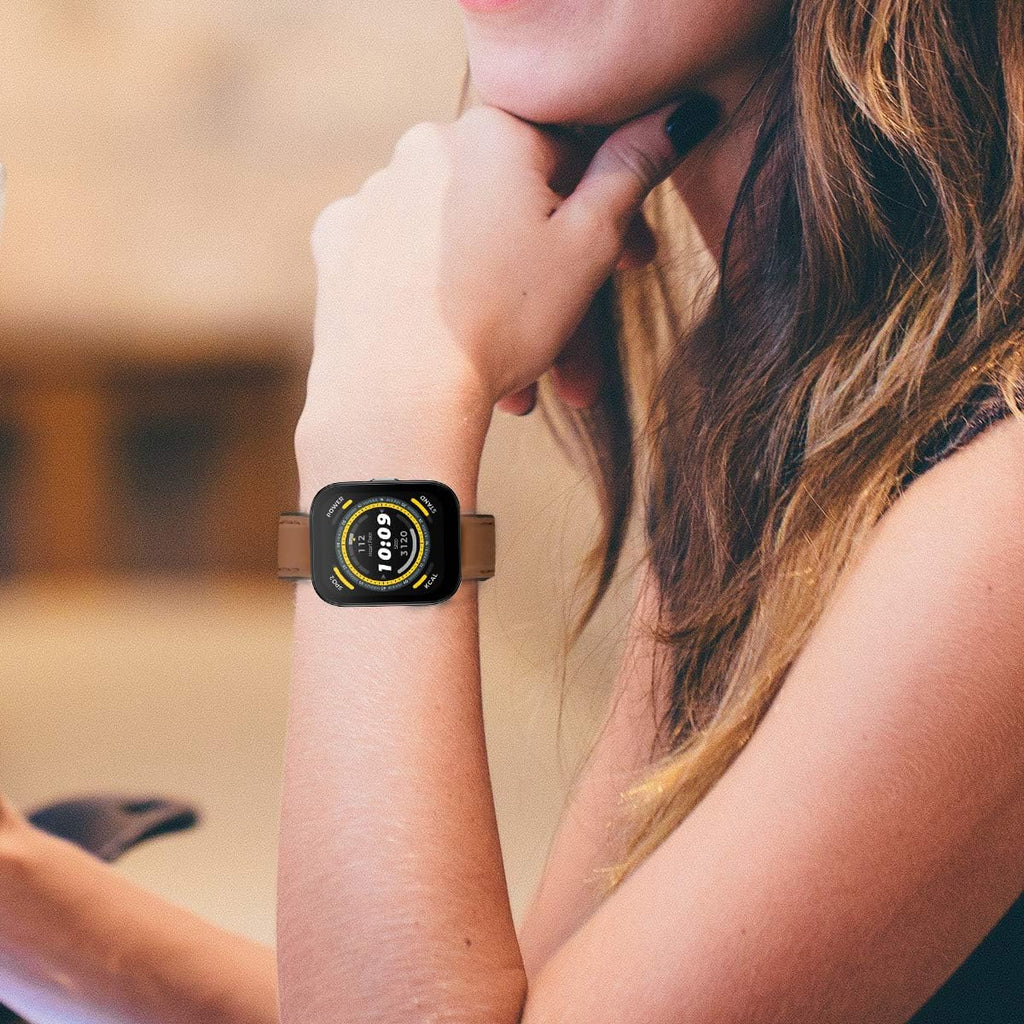 Woman wearing a smart watch with a brown ID208 plus watch band replacement on her wrist