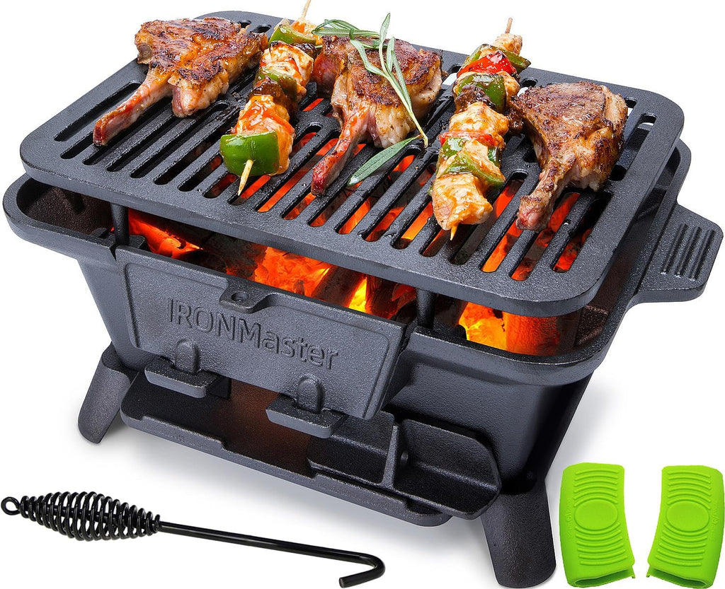 Craques portable cast iron bbq grill with cooked meat and vegetable skewers on grill grates