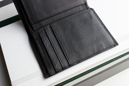 Black leather slim passcase wallet for men with multiple card slots and a sleek design