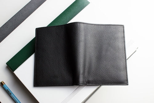 Open view of Craques slim passcase wallet for men made of premium black leather