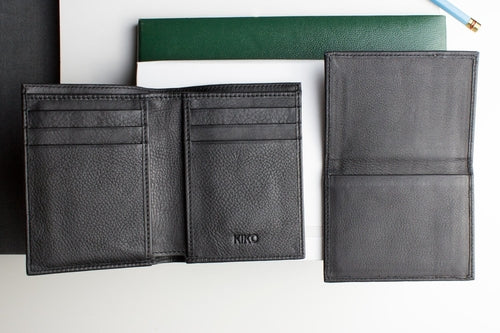 Stylish slim passcase wallet for men in black leather with multiple card slots and a minimalist design