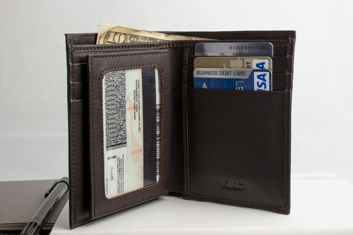 Brown slim passcase wallet for men featuring card slots and a clear ID window